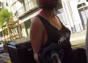 Braless Motorcycle ride in a very light tank top in the city